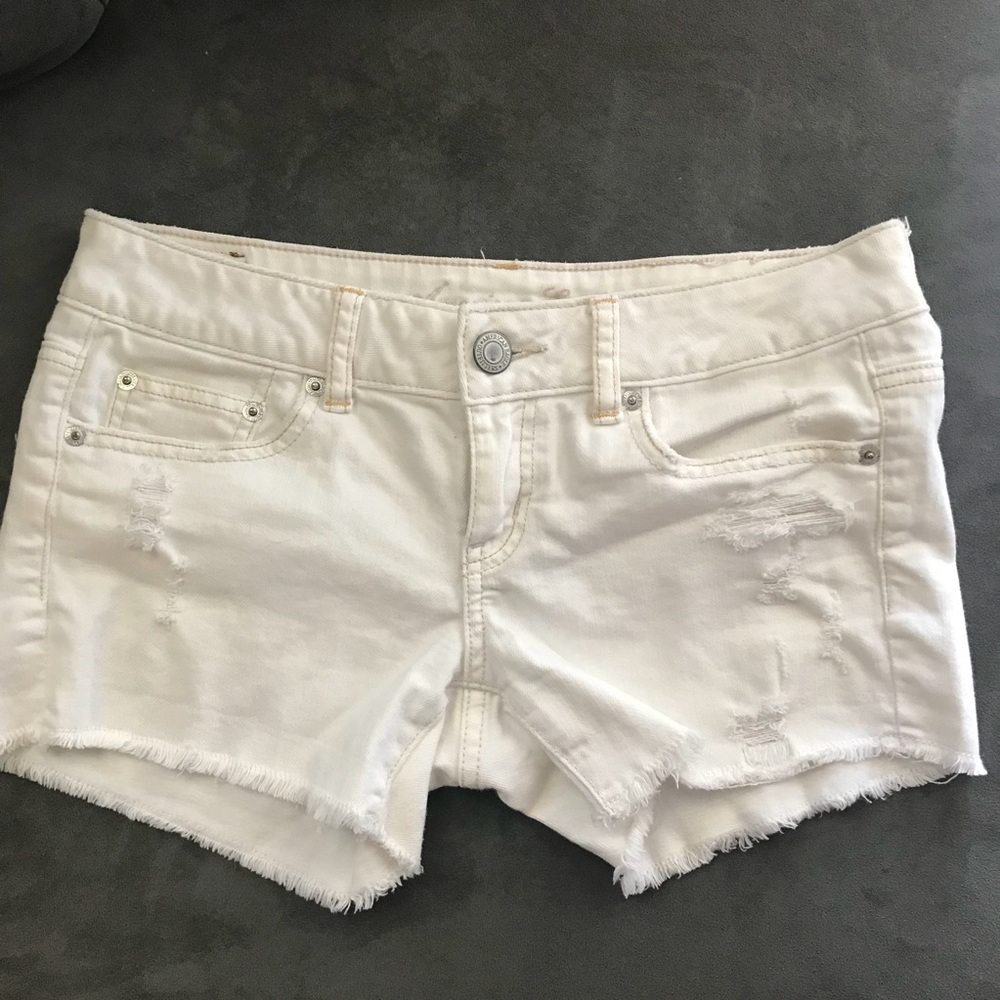 AE distressed white shorts mid rise